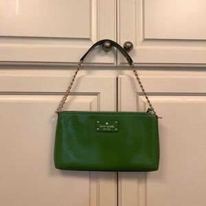 Kate Spade green bag with gold chain.